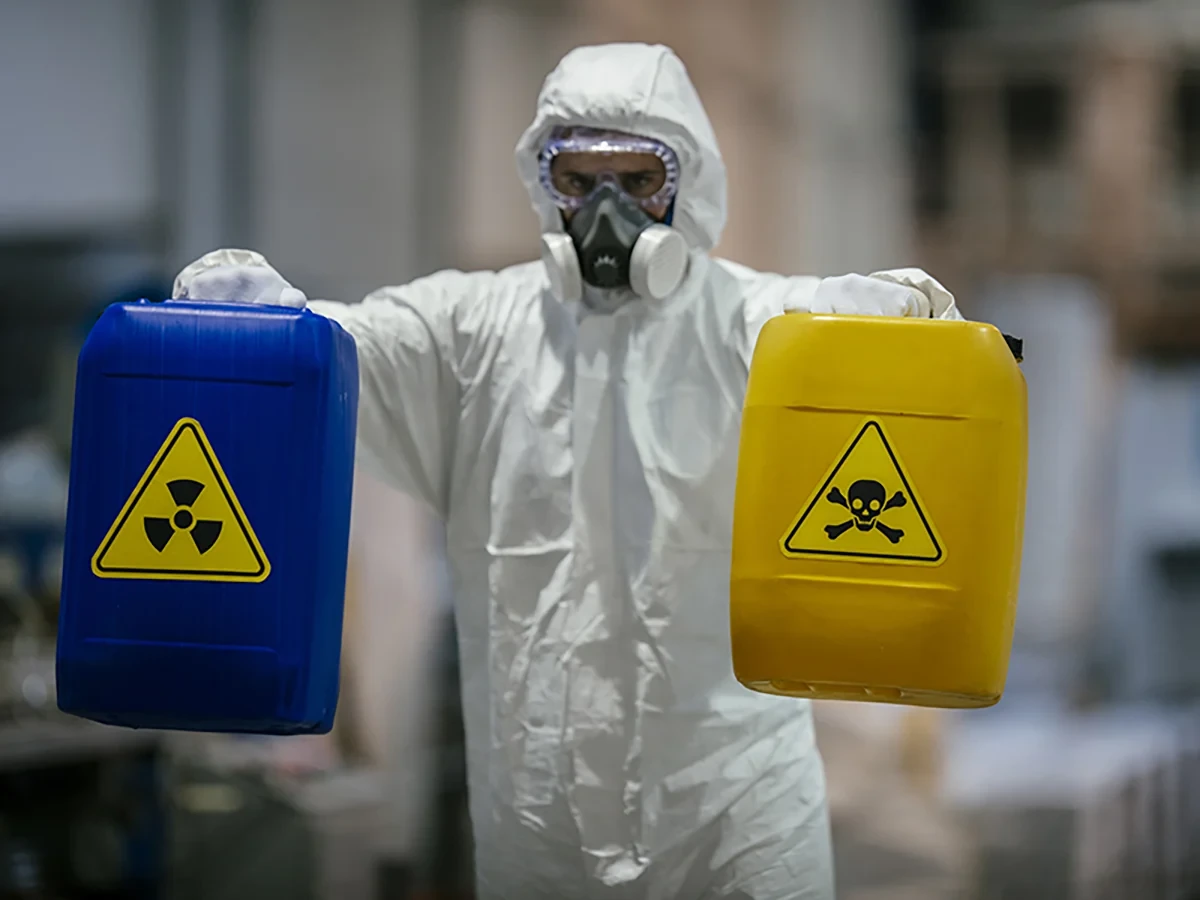Biohazard cleanup technicians in protective equipment at a remediation scene in Fond Du Lac, WI near 54935